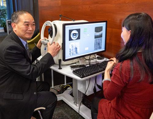 Dr. Wang and OCTA imaging device