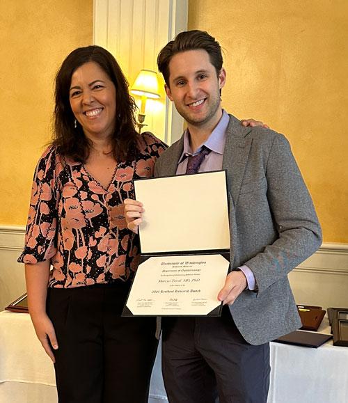 Dr. Toral receives Resident Research Award from Dr. Bojikian